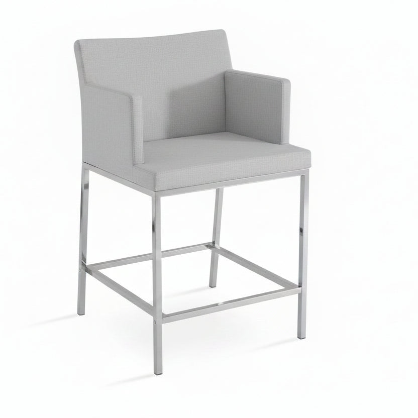 A modern high-back bar stool with dark grey upholstered seat and backrest, supported by a slim chrome metal frame, shown on a white background with a small text label at the bottom.