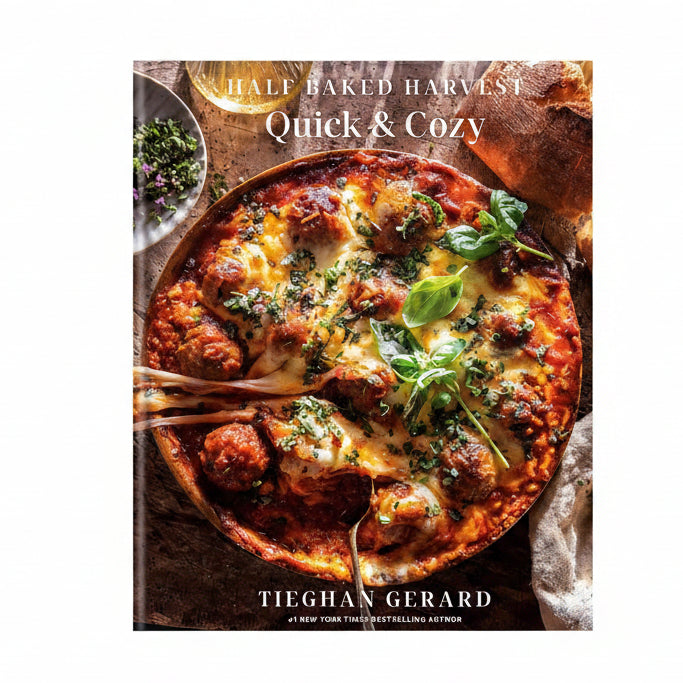 Cookbook cover of 'Quick & Cozy' by Tiegham Gerard featuring a dish with meatballs and cheese.