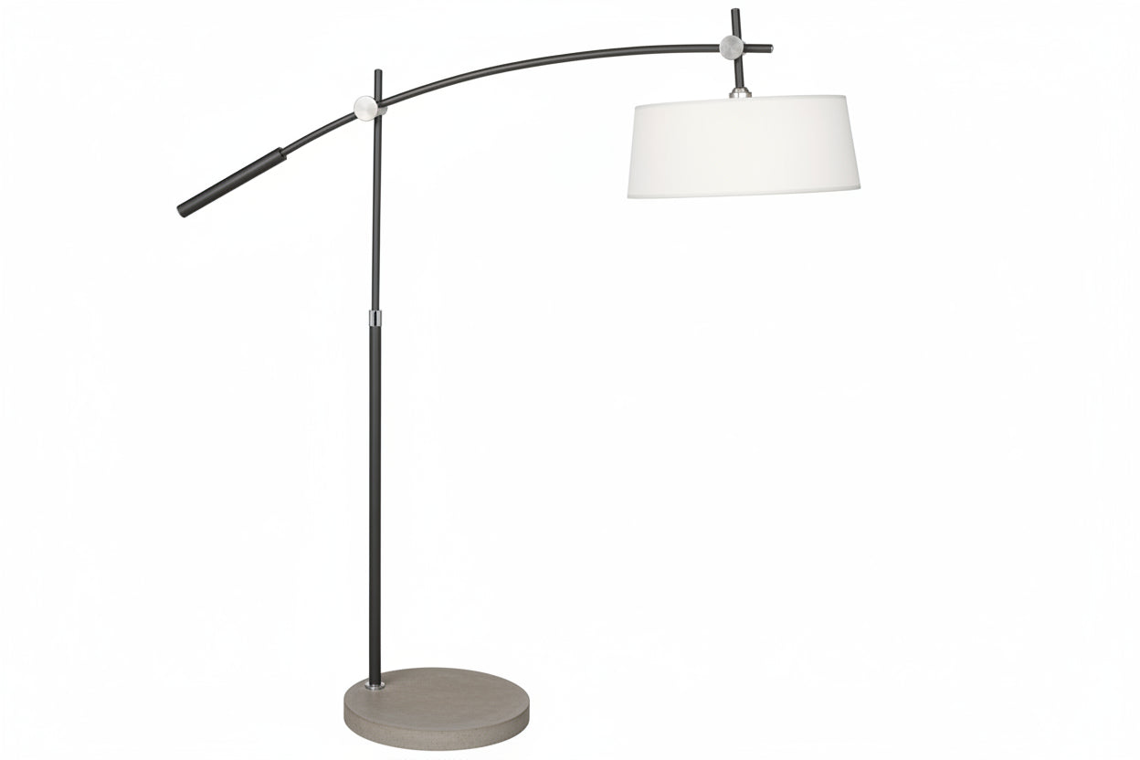 Modern floor lamp with white shade and metal arm on a white background