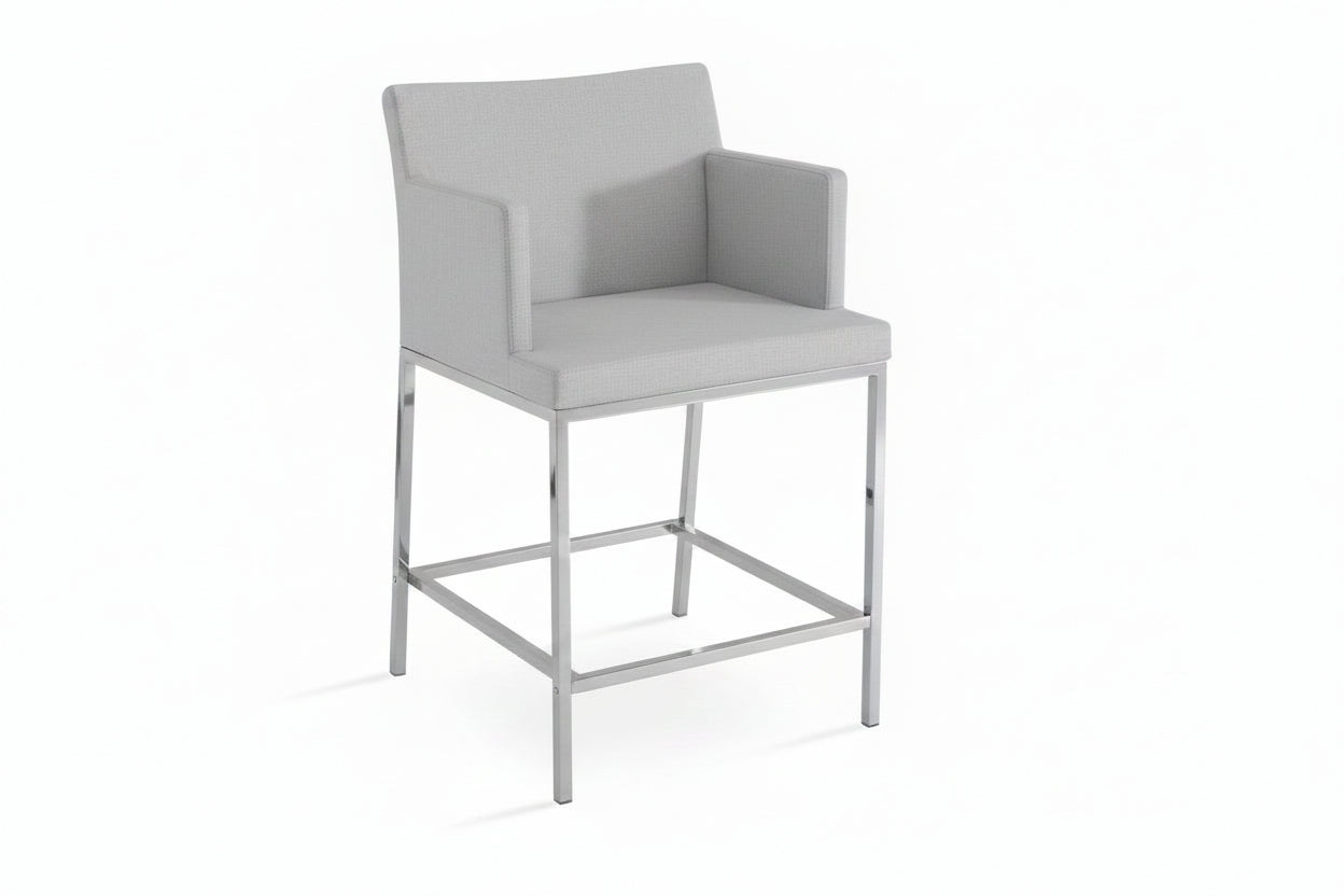 A modern high-back bar stool with dark grey upholstered seat and backrest, supported by a slim chrome metal frame, shown on a white background with a small text label at the bottom.