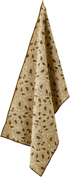 Beige towel with brown floral pattern on a white background