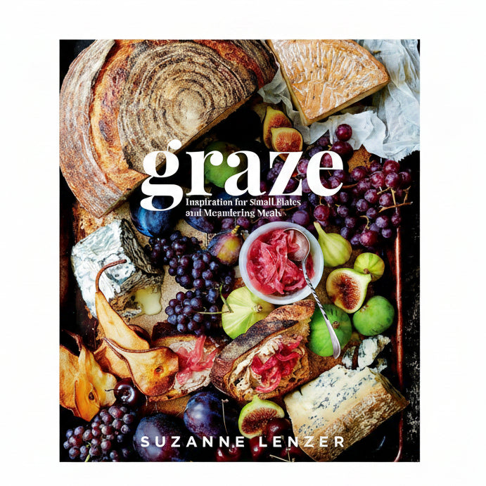 Book cover of 'Graze' by Suzanne Lenzer featuring a platter of food with bread, fruits, and cheese.
