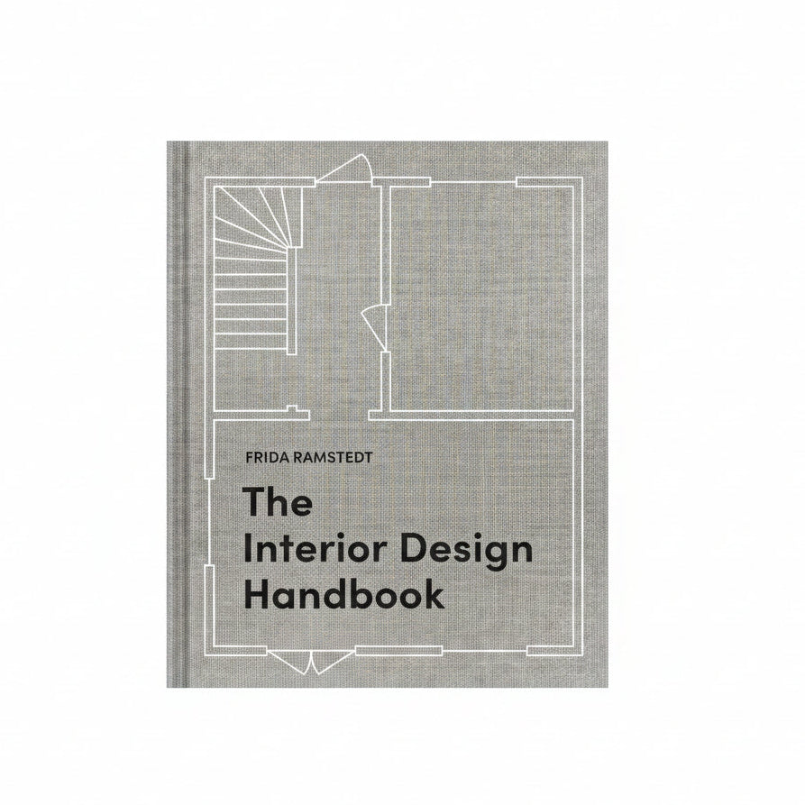 Book cover of 'The Interior Design Handbook' by Frida Ramstedt with a floor plan illustration on a textured gray background.