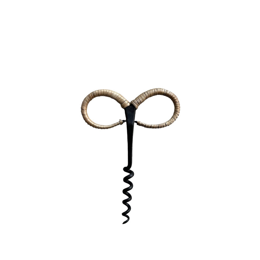 Corkscrew with woven handle on a white background