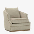 Beige armchair with a pillow on a white background