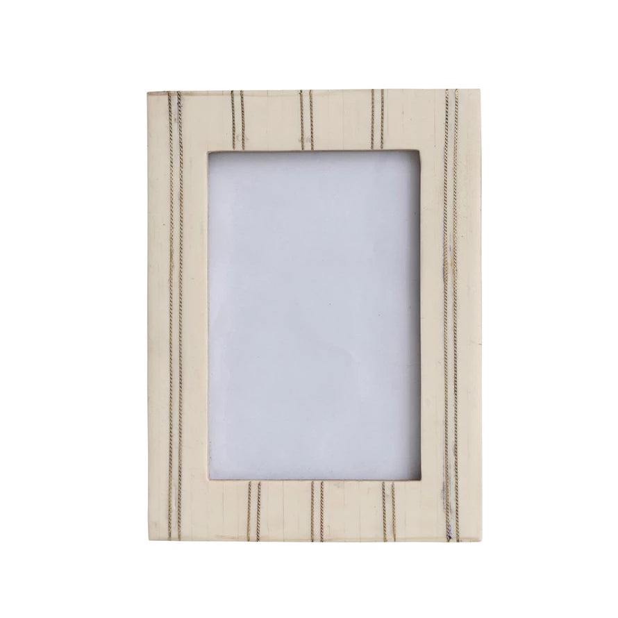 Beige striped picture frame on a white background