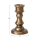 Bronze candle holder with dimensions on a white background